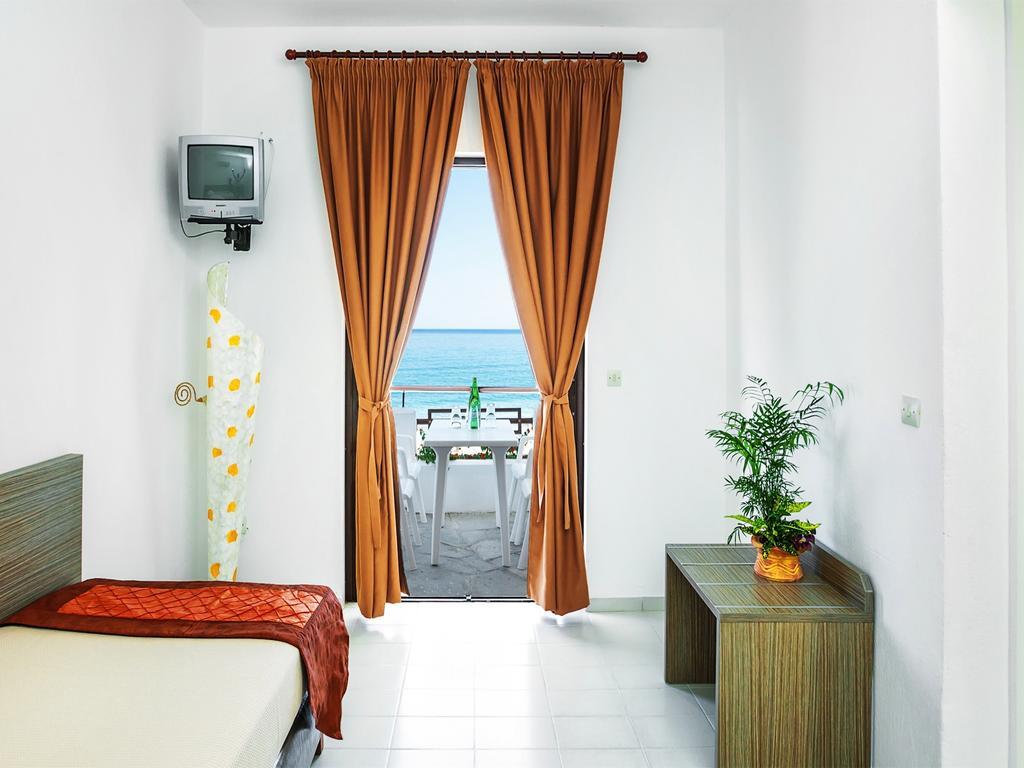 Xenios Dolphin Beach Hotel Posidi Zimmer foto